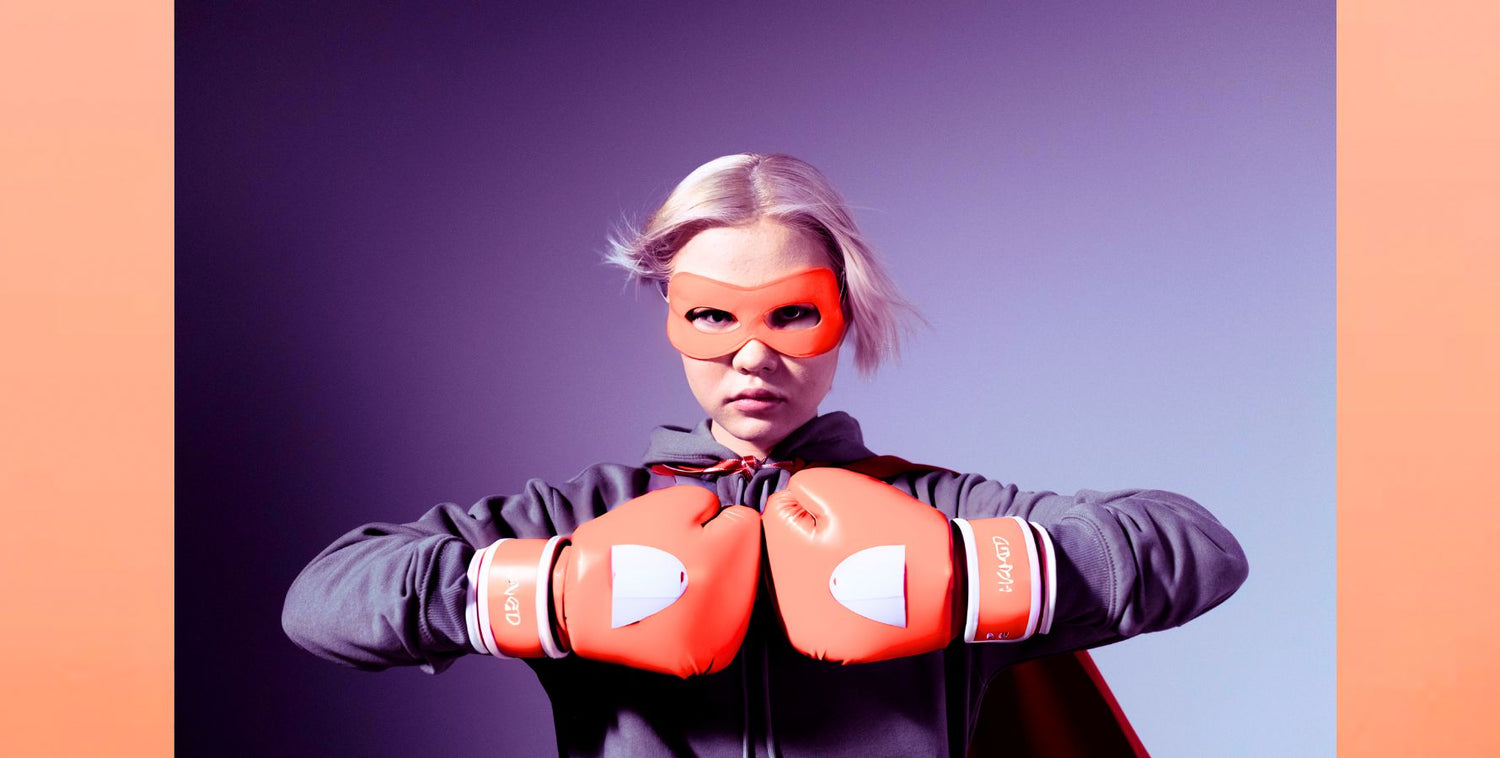 CERM Skin: Skin barrier superhero. Young woman with superhero mask and boxing gloves. Image: Pexels.com/Cottonbro Studio